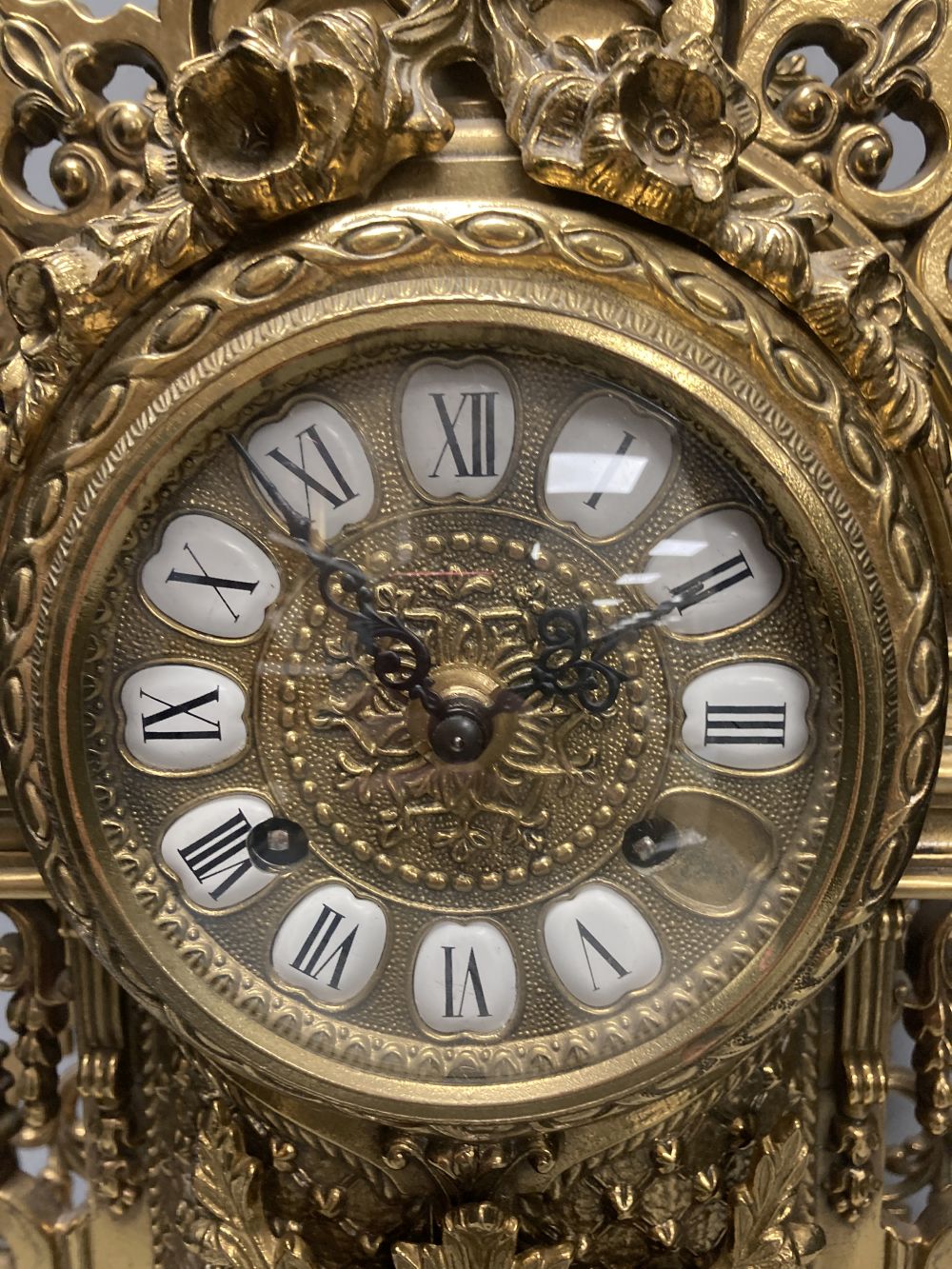 A large 20th century German brass mantel clock, 61cm